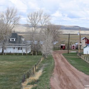 Farmhouse, barn, and acreage